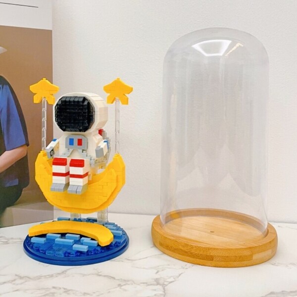 Wise Hawk 2702 Spaceman Sitting on Moon Star Water with LED Light Display Covered Wood Base