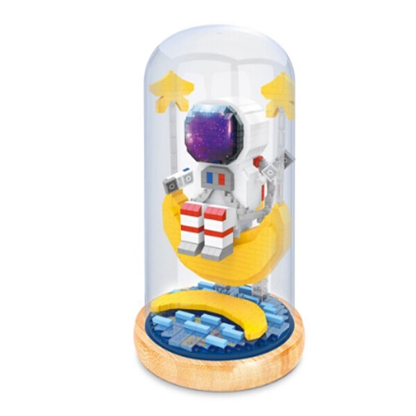 Wise Hawk 2702 Spaceman Sitting on Moon Star Water with LED Light Display Covered Wood Base